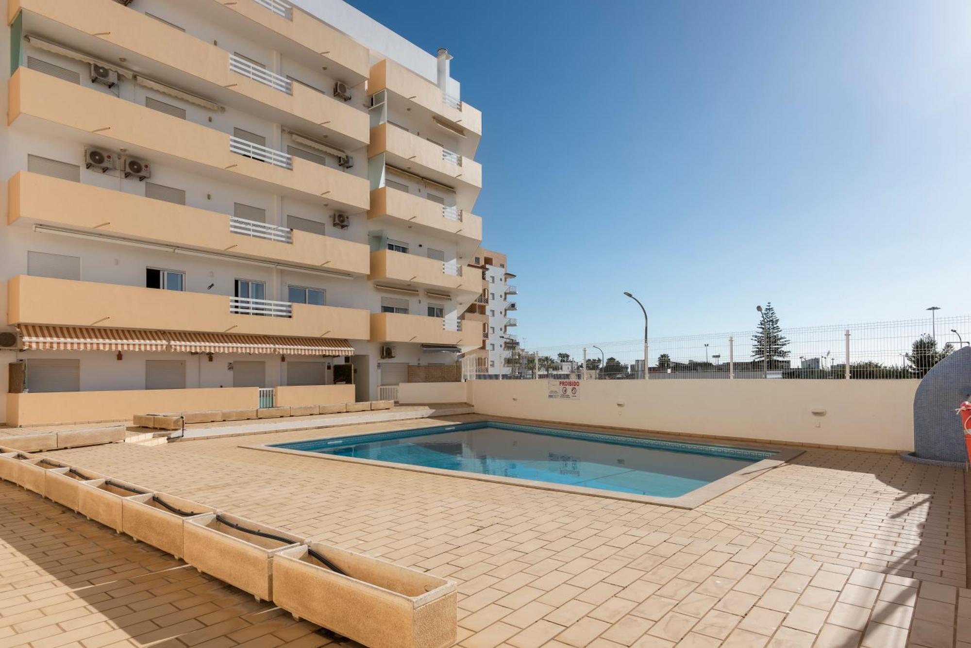 Grace - Quarteira Apartment Bagian luar foto